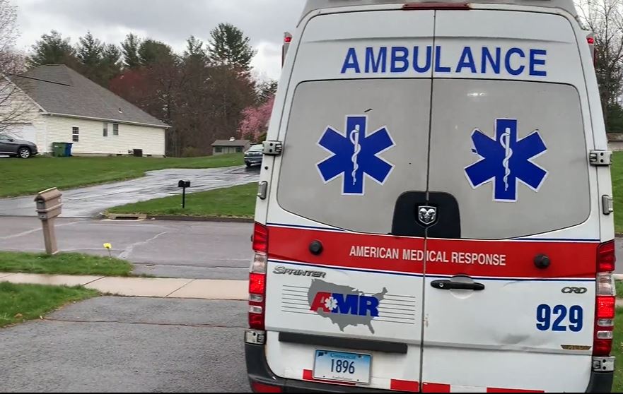 ambulance arrives at customer's home as ramp installation is finished by Lifeway Mobility technician
