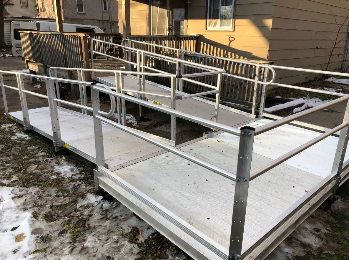 aluminum wheelchair ramp installed with snow on ground in Minnesota