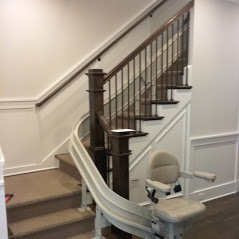 Bruno curved stair lift with park option to prevent rail from being tripping hazard
