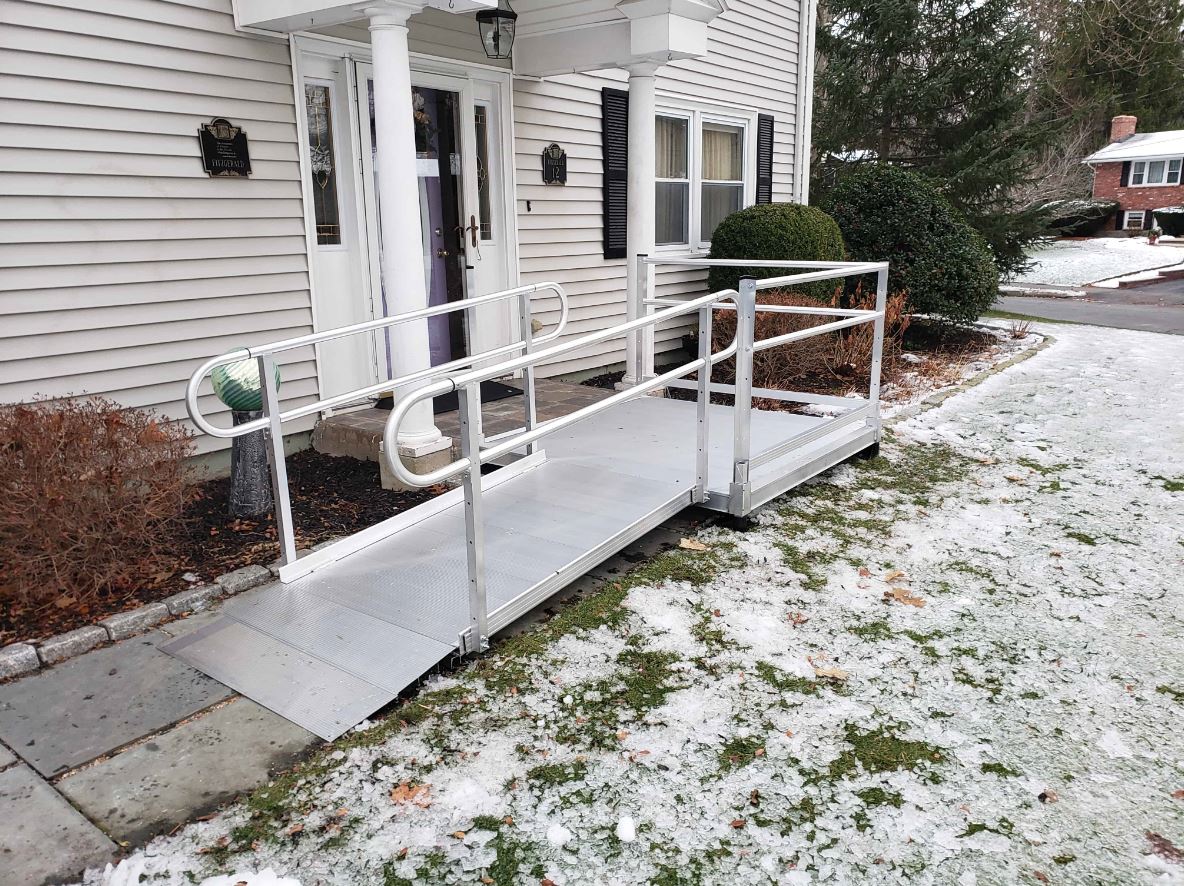 wheelchair ramp cleared of ice and snow during winter