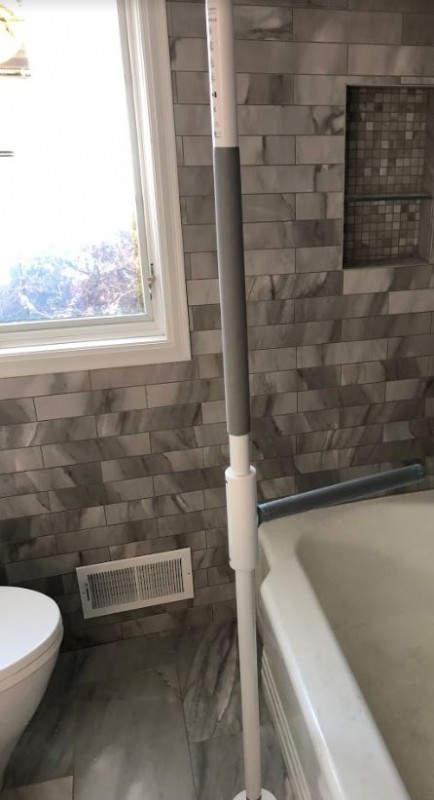 safety pole with bar installed in bathroom in Minnesota