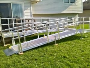 Image of an Aluminum Modular Wheelchair Ramp installed in the backyard of a home in Joliet, Illinois